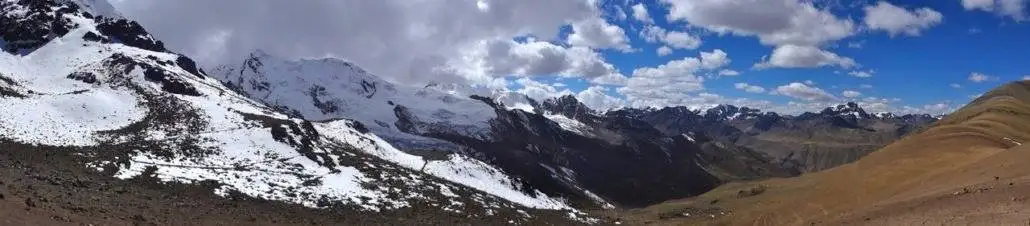 A fish eye lens captures the breathtaking mountains along the Apu Ausangate trekking route.