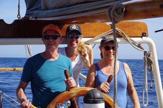 Three nomads on a sailboat.