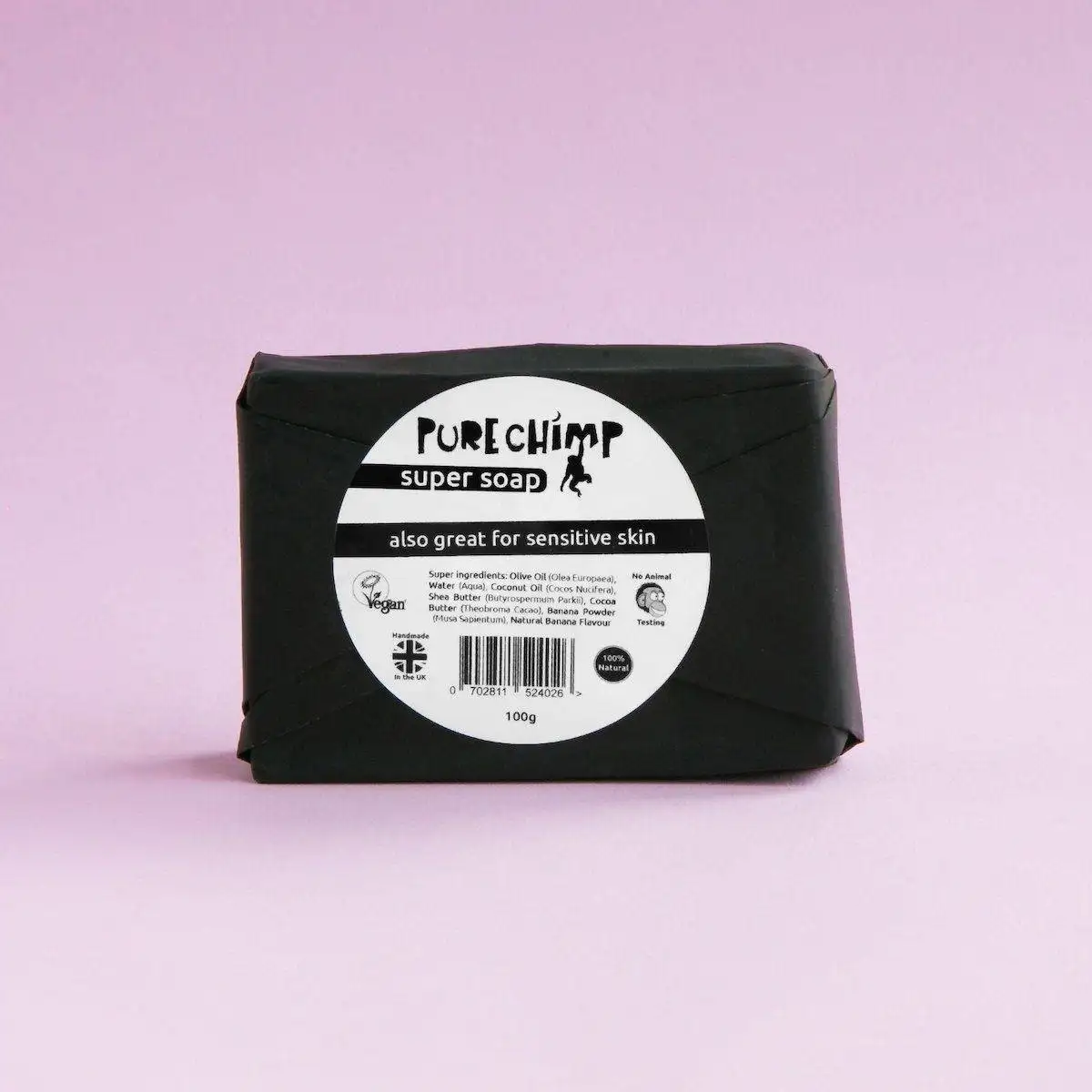 A chemical-free bar of soap on a pink background.