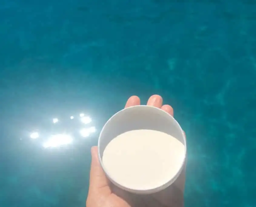 Finished DIY natural reef-safe sunscreen poured into a small metal travel tin