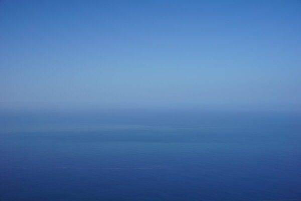 a view of the ocean from an airplane.
