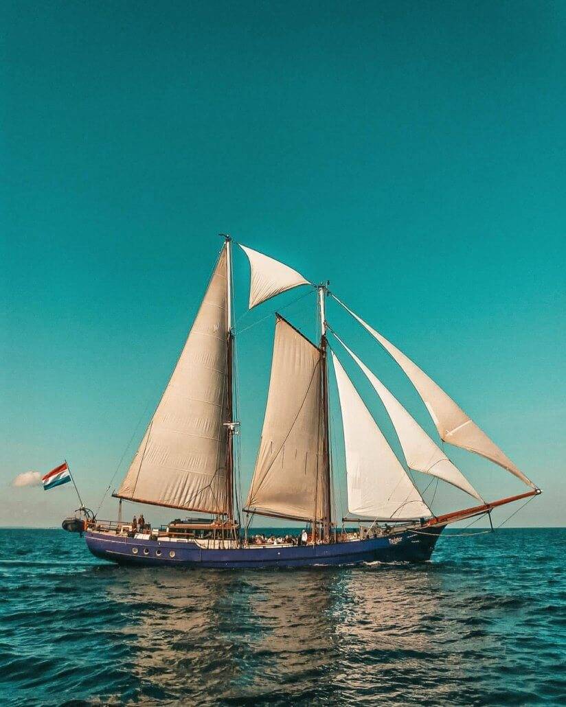 sailing the Atlantic in a sailboat.