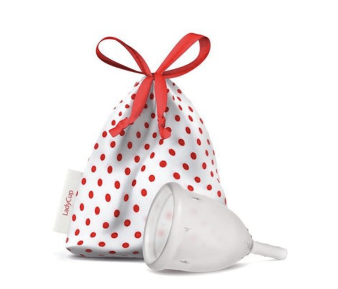 a menstruation cup with a red and white polka dot pattern.
