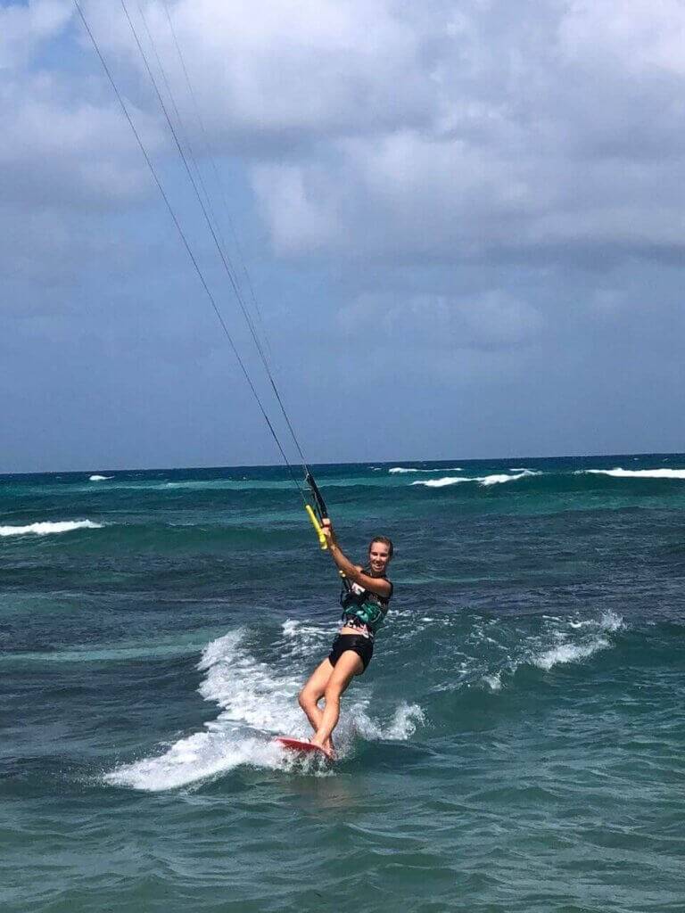 Kitesurfing on the flat turquoise water of the Sotavento lagoon