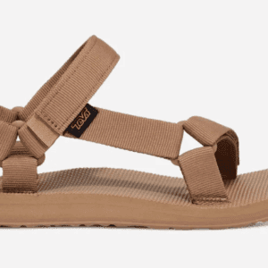 A pair of Teva Sandals with multiple tan webbing straps, an adjustable ankle strap, and a flat sole is displayed against a white background. The sandals also feature a small logo tag near the ankle.
