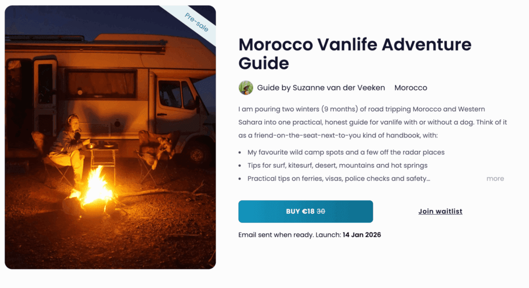 Person sitting by a campfire with a dog next to a camper van at dusk, promoting a Morocco vanlife adventure guide.